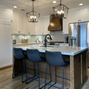 Small Farmhouse kitchen. Remodel Pendant lights white cabinets & granite countertops.